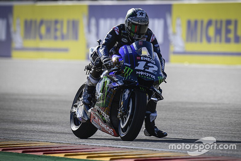 Vinales fastest in damp warm-up