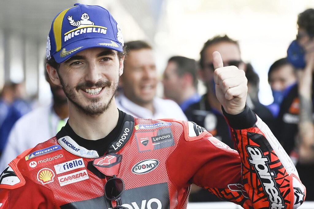Bagnaia smashes lap record to take pole