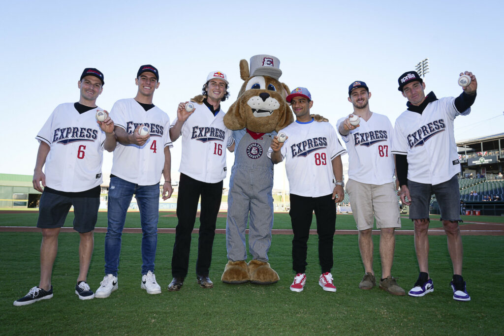 World Championship racers (from left) Cameron Beaubier, Sean Dylan Kelly, Joe Roberts, Jorge Martin, Remy Gardner, and Aleix Espargaro with the Round Rock Express team mascot