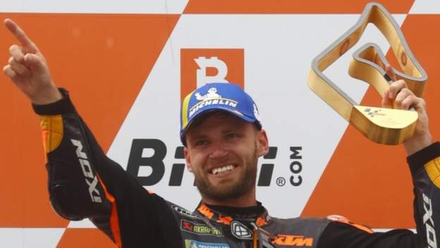 Austrian MotoGP: Brad Binder holds on for surprise win after late downpour